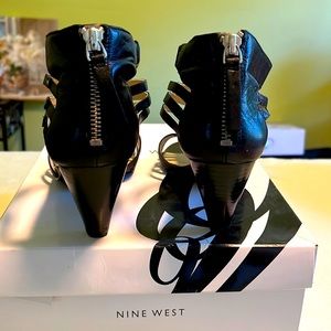 Nine West leather black sandals, size 6 1/2, good condition, zip up the back.